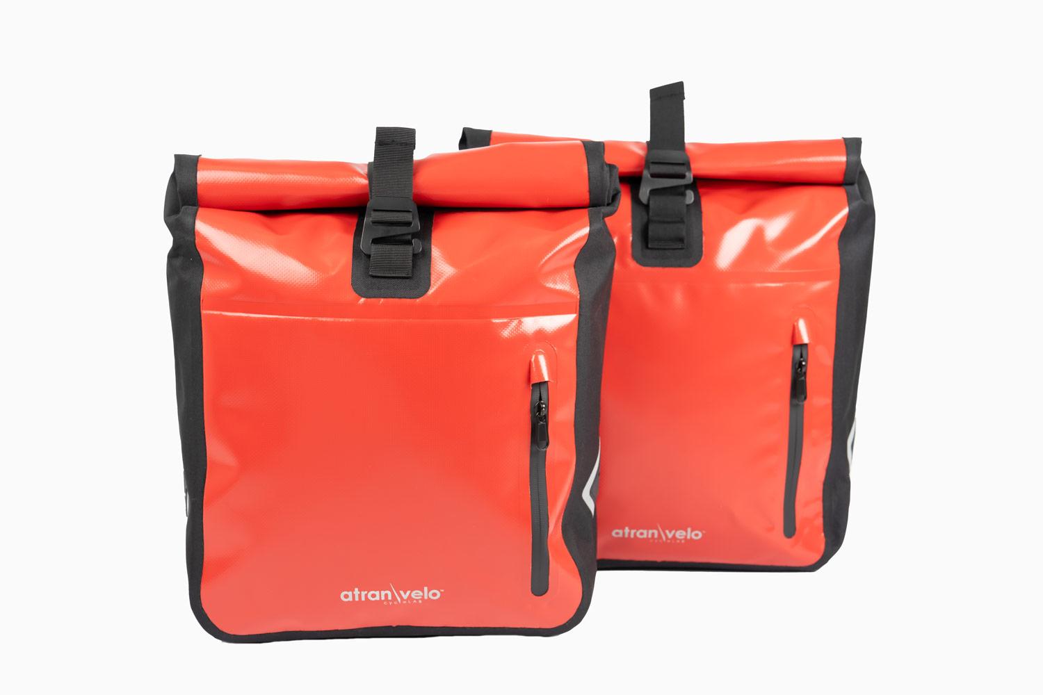 Two red travel bags from the front
