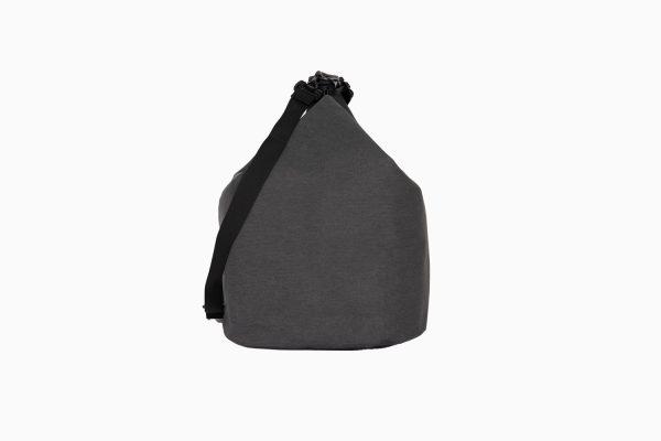 Grey bag with light grey background in studio