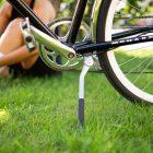 A close-up of a chrome-colored bike stand.