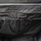 Inside of a max side pannier, it is a black interior mesh and you can see two pockets