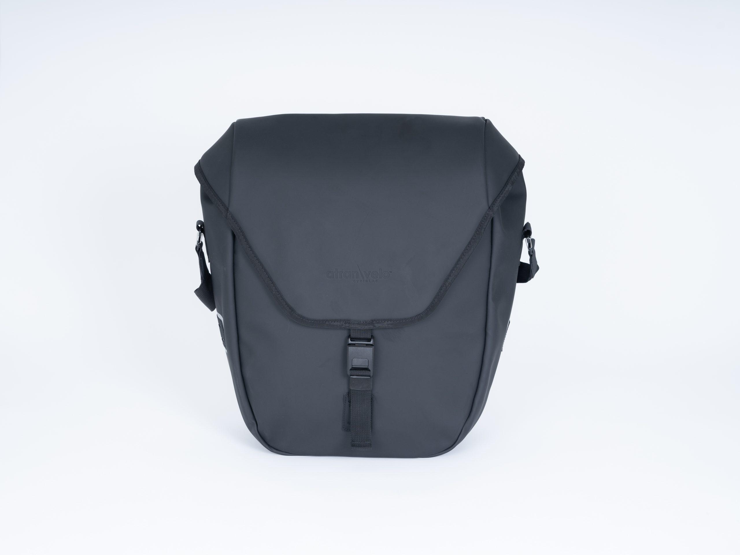 A black sidebag in a studio