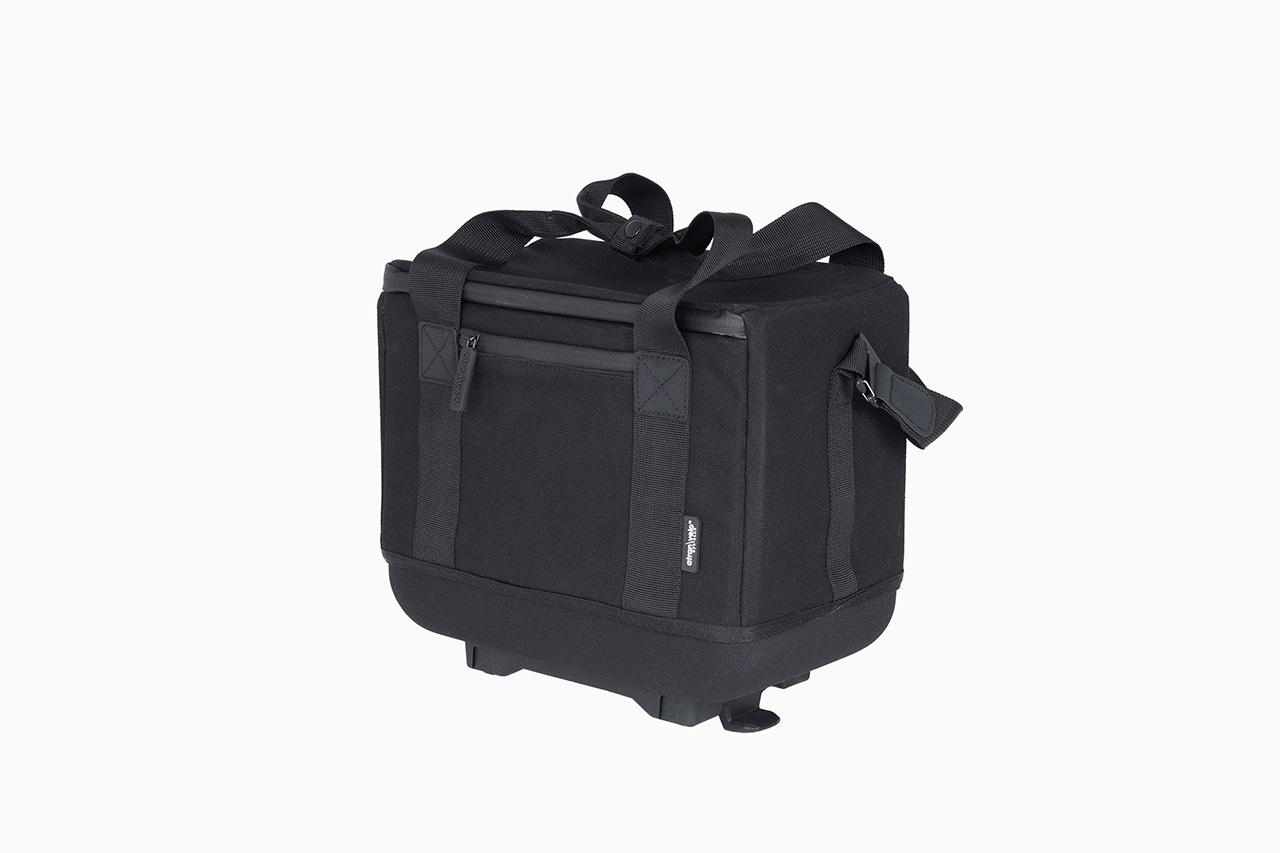 A black topbag in a studio