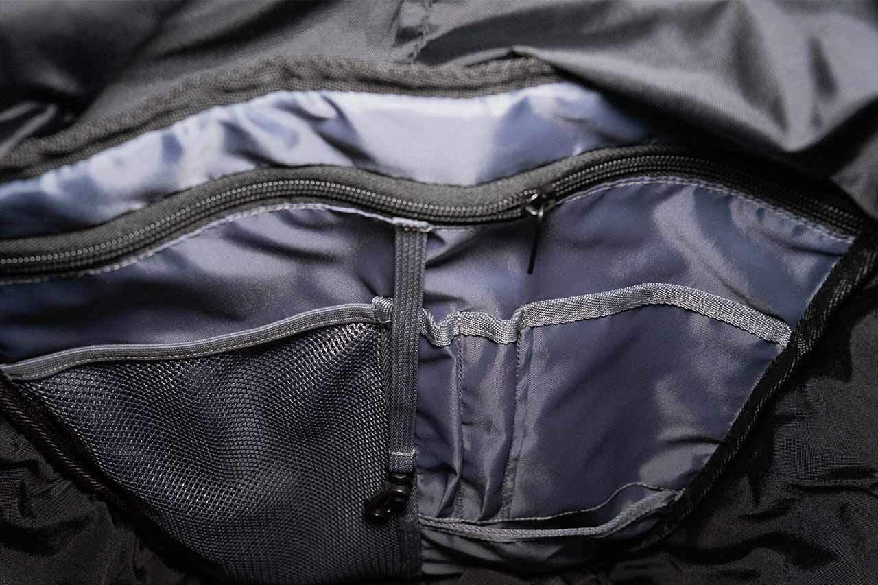 Inside of a black bag with pockets