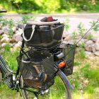 three baskets on a bike out in nature, two at the sides and one at the top