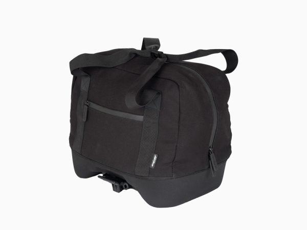 A black topbag in a studio