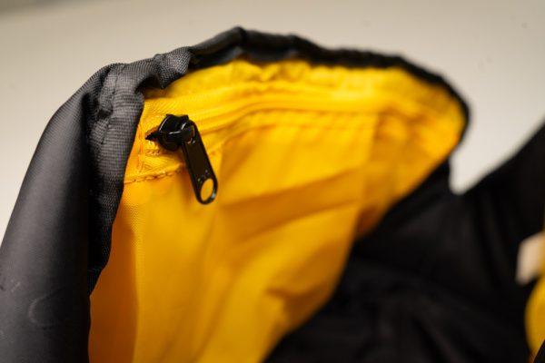 A yellow inside zippered pocket