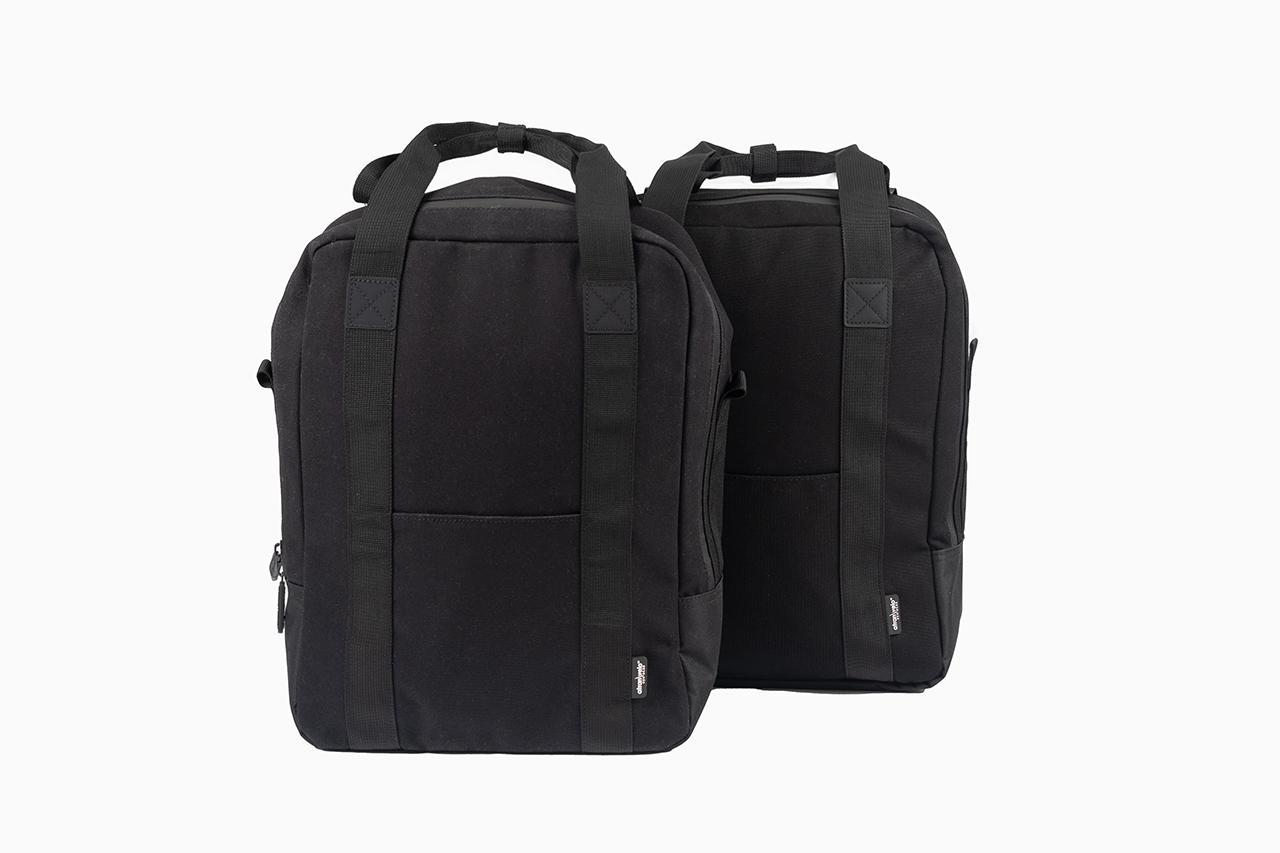 Two black sidebags in a studio